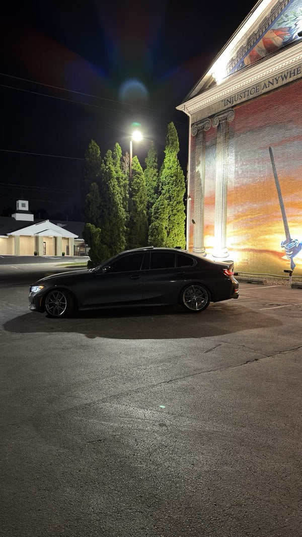 BCSC Build 001 — wide mural portrait of Ev's Mineral Gray BMW 330i xDrive