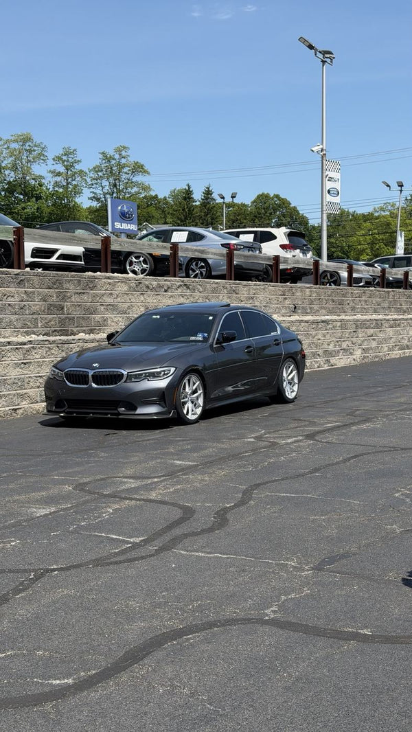 BCSC Build 001 — Ev's Mineral Gray 2022 BMW 330i xDrive in a daytime lot