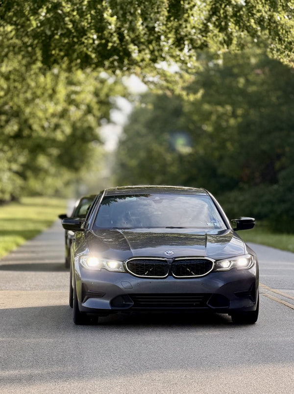 BCSC Build 001 — front road portrait of Ev's 2022 BMW 330i xDrive